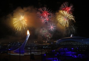 Fireworks go off over the Olympic Cauldron. 