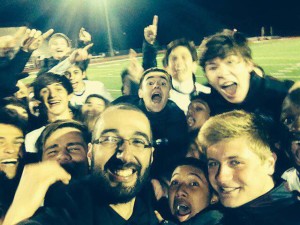 Coach Salerno takes a selfie with his team in celebration of winning district