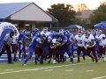 A&M Consolidated struggles to move offensively as the game against Copperas Cove heatedly begins on Aug. 30, 2013.