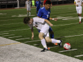 Junior Ulysses Sixtos dribbles the ball away from the opponent. Photo by Maya Girimaji