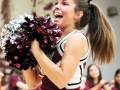 Senior varsity cheerleader Celeste Brantley smiles and cheers during the pep rally.